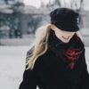 woman wearing black wool winter jacket