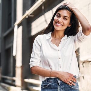 woman wearing white button up shirt